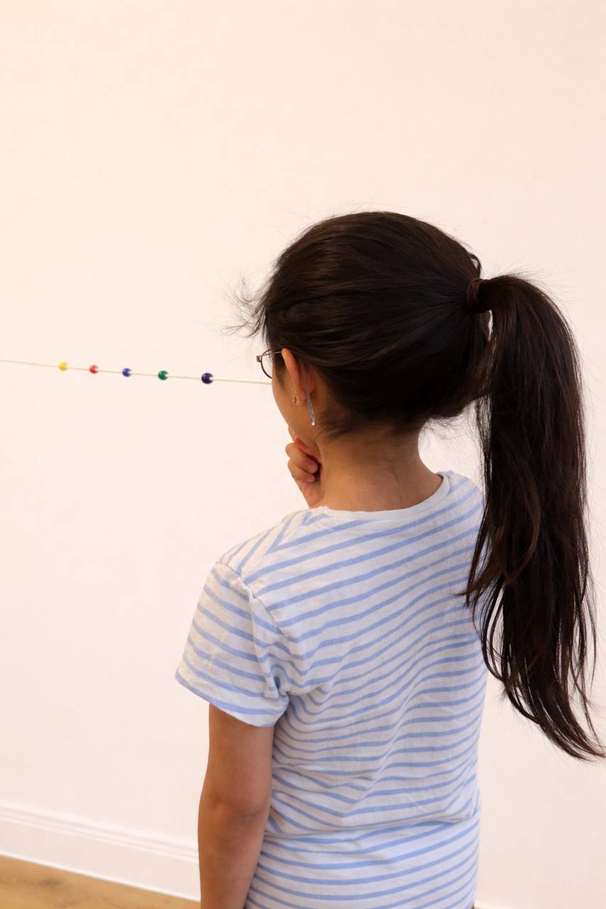 Girl performing vision therapy exercises